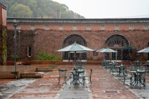 Kurashiki Ivy Square courtyard—a retro red-brick space with ivy-covered walls, beautifully lit at night.