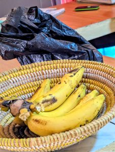 A bunch of bananas placed in a basket.
