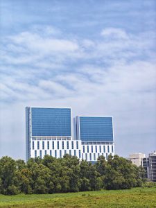 Beautiful iT building in the river view and trees

