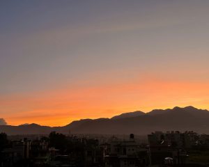 Orange Sunset on an evening landscape scenic mountain view 