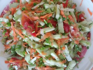 Green Salad served in a white plate 