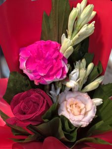 A vibrant flower bouquet featuring colorful roses and fragrant white tuberose flowers. Fresh flower bouquets are popular in Bangladesh for celebrations, gifts, weddings, and special occasions.

