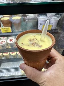 A cold drink or lassi served in an earthen pot.