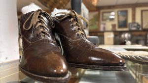 Old fashioned ladies boots, seen close up in a museum.
