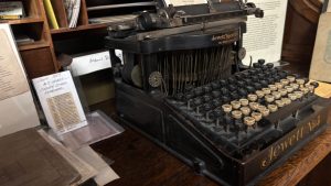 An antique typewriter in a museum.