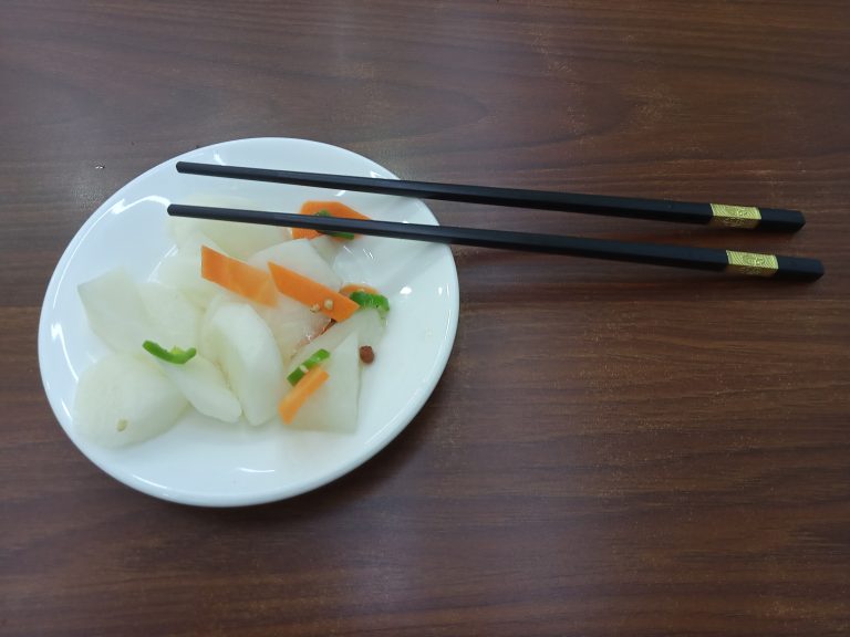 Raw vegetables with chopsticks at a Chinese restaurant in Kathmandu, Nepal