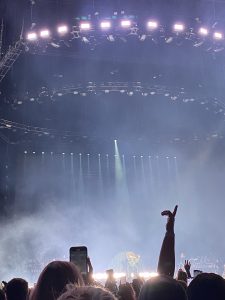 Hands raised at a concert
