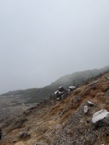 Foggy volcanic landscape near the main crater at Poás Volcano National Park, Costa Rica