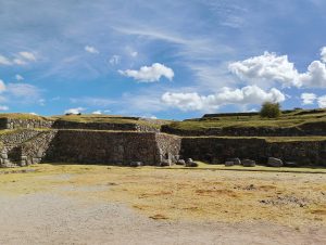 Inca terraces at Sacsayhuaman, near Cusco, Peru. The terrace walls are built from a mix of large and small carefully fitted stone blocks.