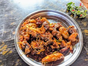 Katogo with meat and matooke.