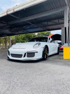 Porsche GT3 parked in the pits at the Costa Rica racetrack for a drift and carmeet event.