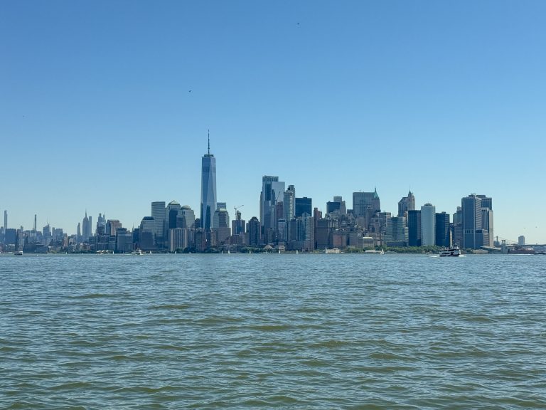 The New York City skyline as seen from a ferry in New York Harbor.