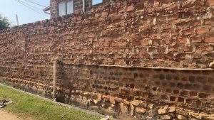 A brick and mortar wall in Kampala city