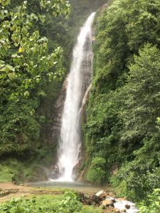 A beautiful waterfall flowing endlessly in the embrace of nature.