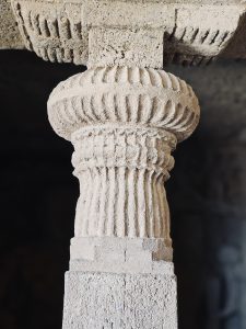 A close-up of a beautifully carved stone pillar reveals the fine craftsmanship preserved at Kanheri Caves. The detailed patterns show the skill of ancient artisans who carved these monuments from solid rock. Captured at Sanjay Gandhi National Park, Borivali East, Mumbai.
