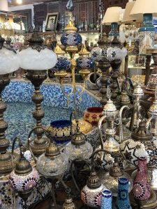 
Colorful decorative lamps displayed in a market.