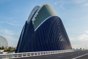 Ágora building at Valencia’s City of Arts and Sciences under a clear blue sky.