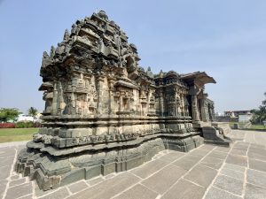 A side view highlights the temple’s intricate stone carvings, decorative pillars, and finely sculpted walls. Every section reflects the artistic excellence of medieval temple architecture. Captured at Kasivisvesvara (also known as Kavatalesvara or Kashivishveshvara) Temple, Lakkundi, Gadag district, Karnataka.

