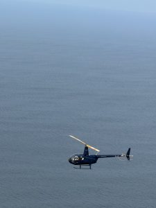 
A helicopter flying over Rio de Janeiro.