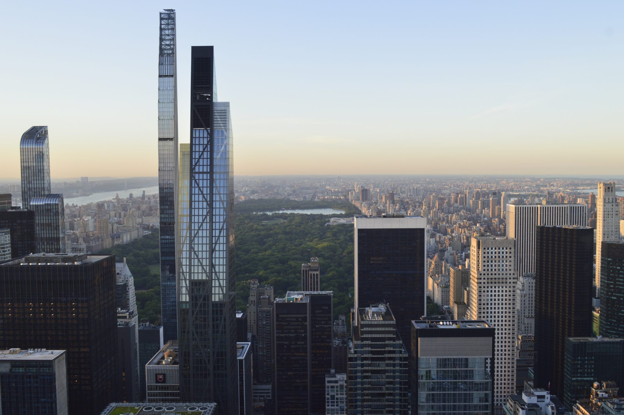 Downtown skyline of high-rise towers at dusk — photo by Joel Peralta, CC0, via Openverse