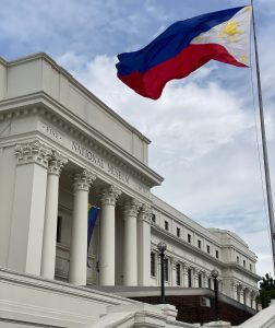 Beneath the colors of the Philippine flag, the National Museum stands as a keeper of the country’s heritage.