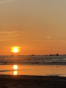 Sunset reflected on water surfaces with mirror effect.