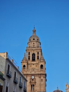 Bell Tower of the Cathedral of Saint Mary in Murcia Under Blue Sky