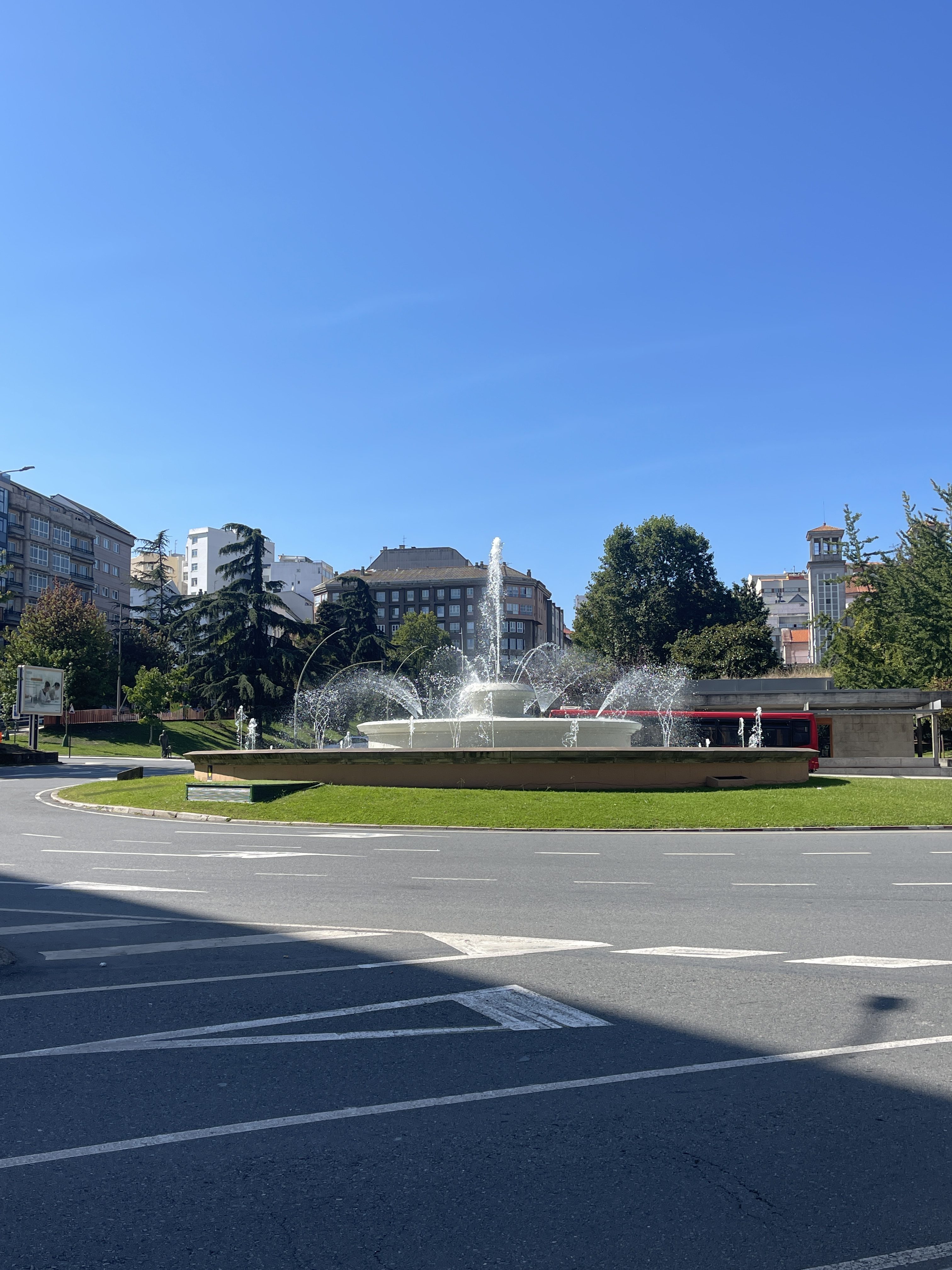 A water fountain near to the buildings