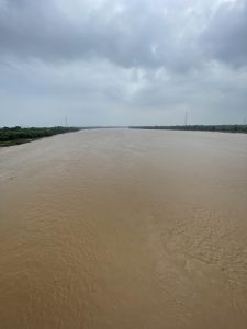 Photo of Narmada river, the longest river of Madhya Pradesh and the 5th longest in India, taken from the bridge above it.